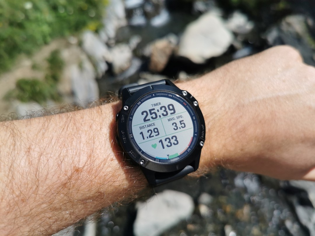 Garmin Fenix 6 shown on wrist outdoors