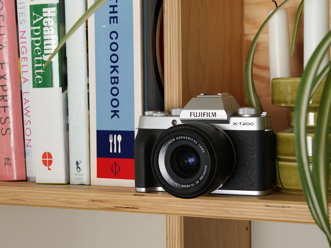 Fujifilm X-T200 placed on a book shelf