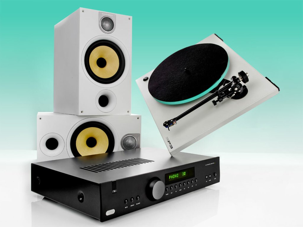 Traditional stereo setup with speakers, turntable and amplifier