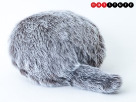 Petit Qoobo is a tiny headless robot cat that wags its tail as it lives in your bag