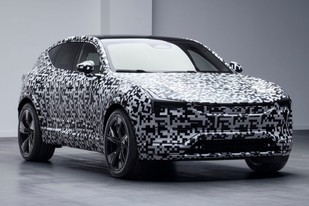A prototype Polestar 3 electric SUV with a camouflage paint job