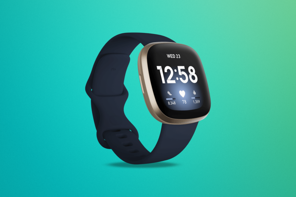 Fitbit Versa 4 against a green/blue background
