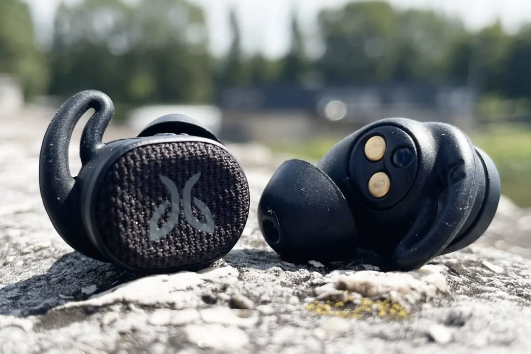 The Jaybird Vista 2 true wireless headphones pictured against concrete