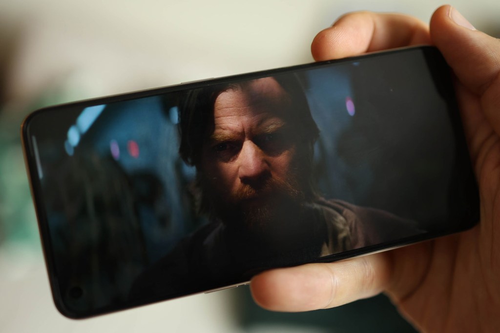 Stuff.tv Realme 9 smartphone review - in hand display showing Obi Wan Kenobi trailer