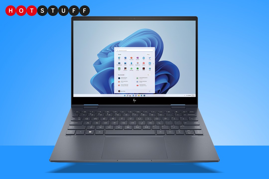 Stuff HP Envy x360 13.3 2022 laptop open face on blue background