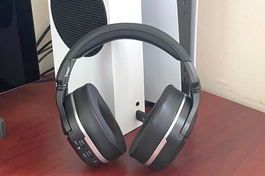 Turtle Beach Stealth 700 Max Gen2 headset in front of PS5 and Xbox Series S