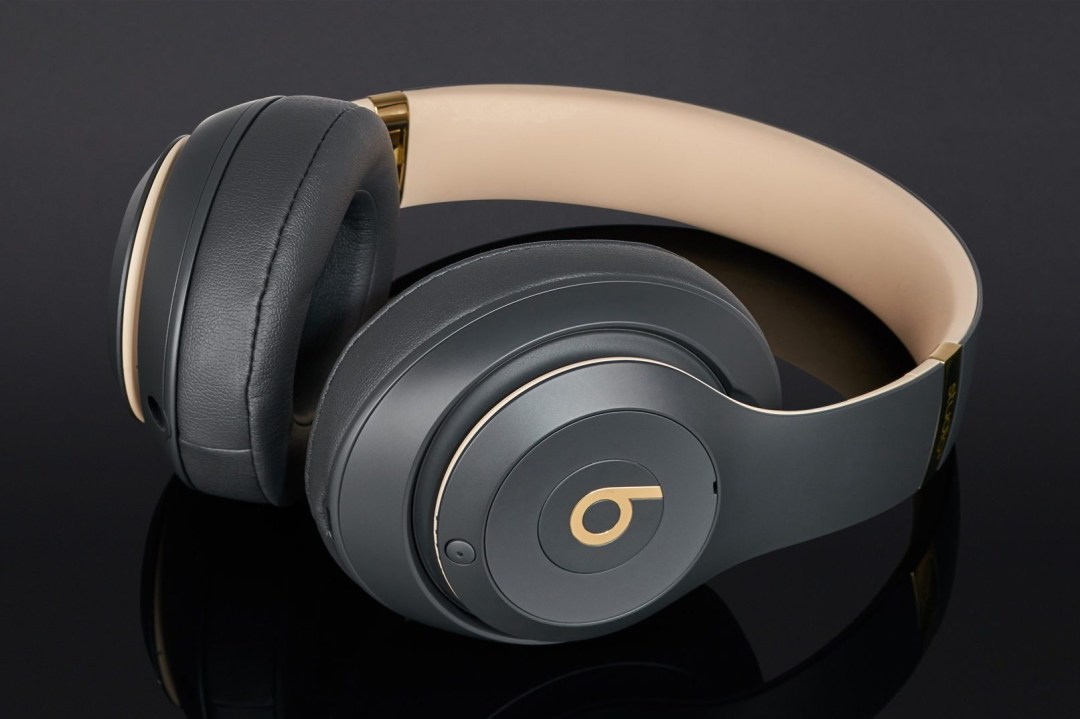 A pair of Beats Studio3 wireless headphones against a black background