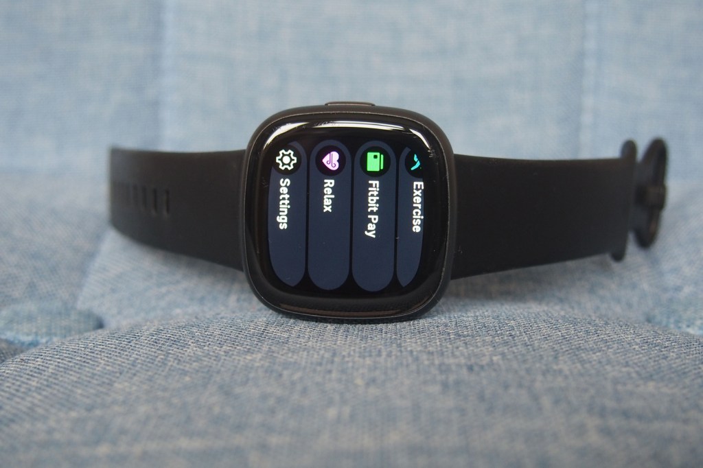 Fitbit Versa 4 on its side