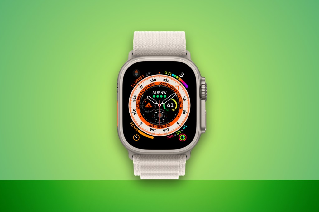 Apple Watch Ultra against a green background