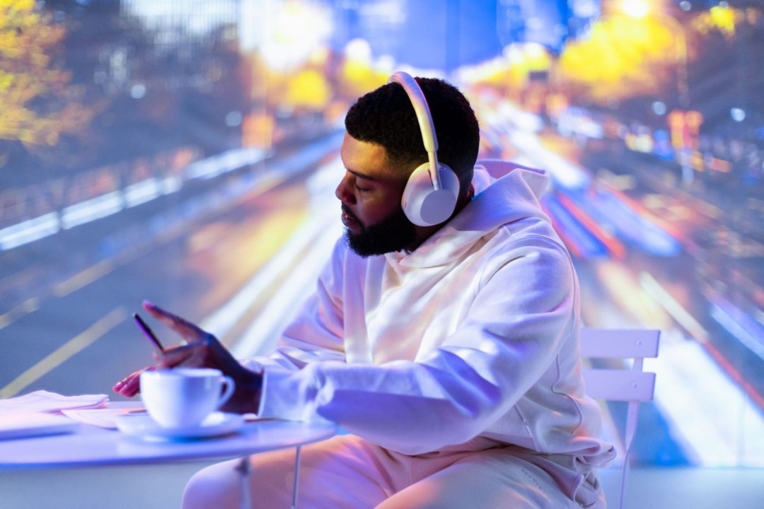 Sony Music Entertainment artist Khalid wearing the Sony WH-1000XM5 headphones in silver