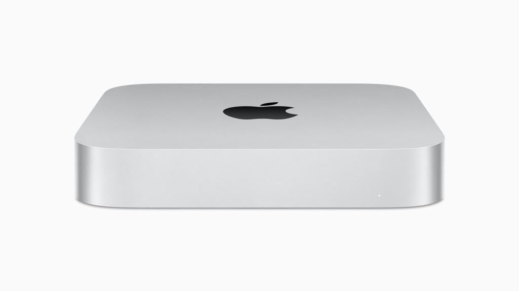 New M2 Mac mini close-up, against white background