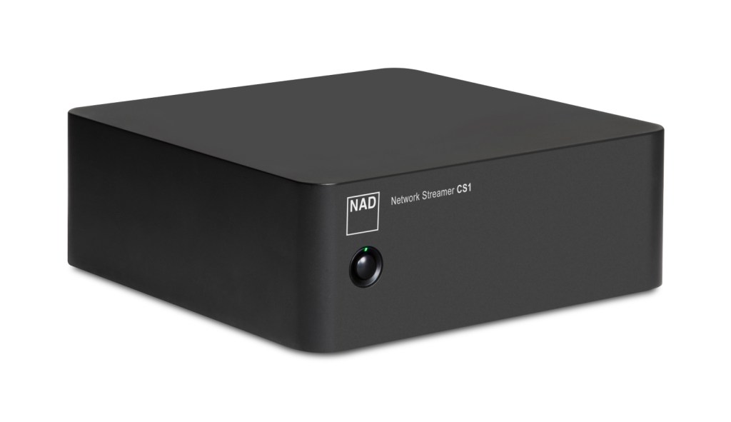 A black box on a white background shown from an angle. The box has NAD Network Streamer CS1 written on it over a circular black button and green power light.