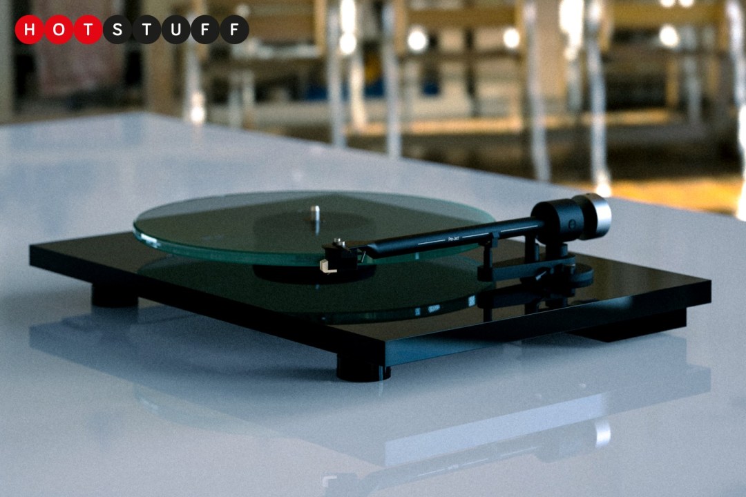 A black Pro-Ject T2 W turntable on a table top